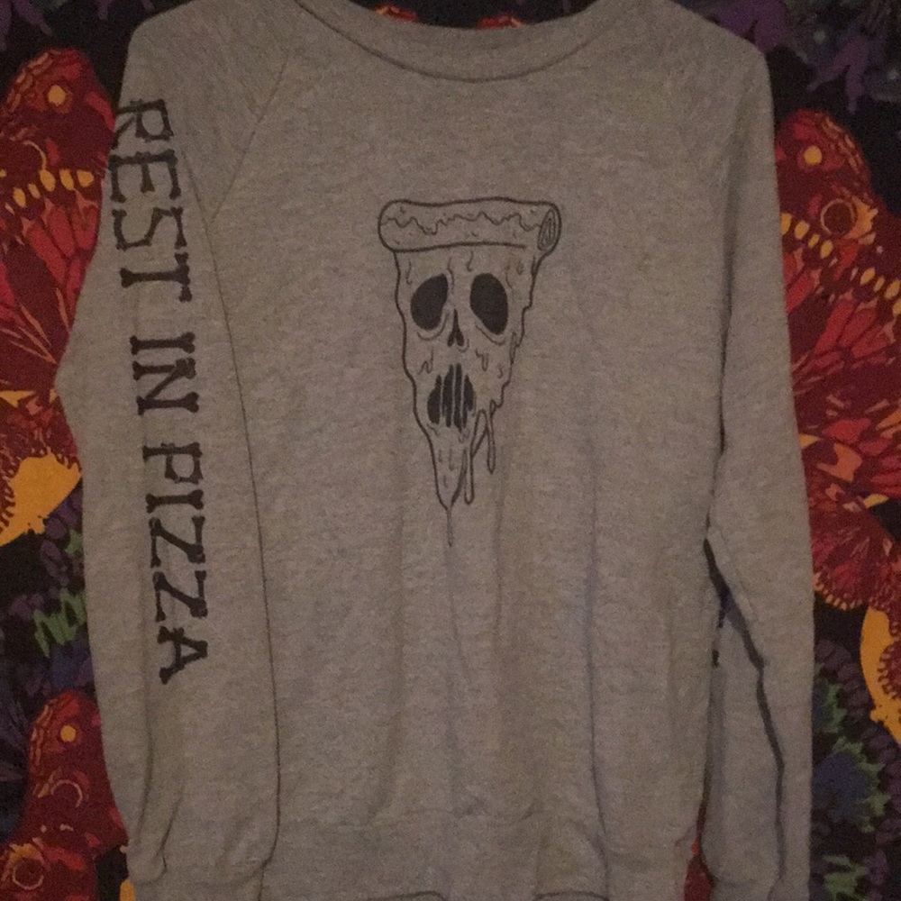 A grey sweater